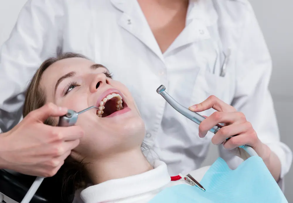 a woman getting her teeth checked