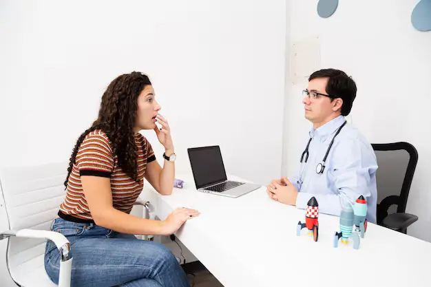 Young girl receiving a dental examination for tongue thrust assessment, with myofunctional therapy options available at Limestone Hills Orthodontics in Austin, TX.