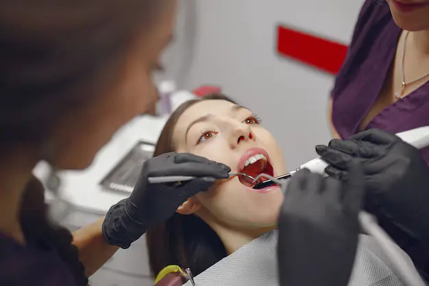 Woman undergoing orthodontic treatment for tongue thrust correction and improved tongue posture at Limestone Hills Orthodontics in Austin, TX.