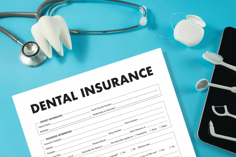 Dental insurance form with stethoscope and toothbrush, showing Invisalign coverage. Limestone Hills Orthodontics, Austin TX